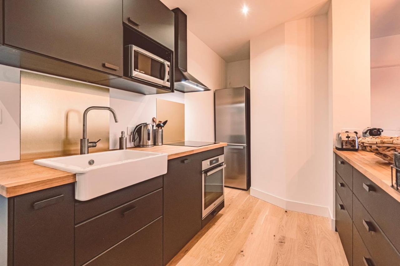 Charme de l'ancien pour cet appartement entièrement rénové dans l'hypercentre de Reims Esterno foto